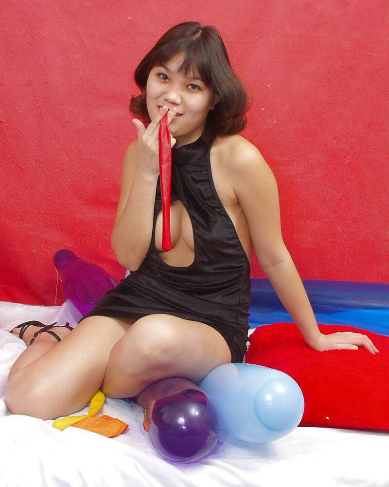 Naughty thai girl in sexy dress playing with a big red balloon - #11