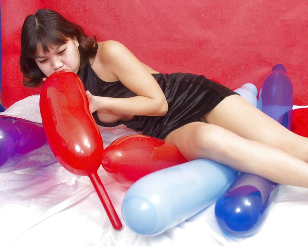 Naughty thai girl in sexy dress playing with a big red balloon - #13