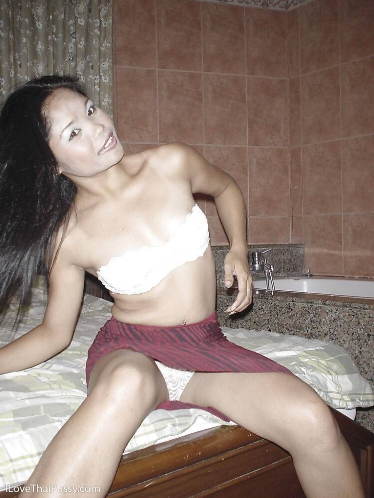 Smiley thai slut with shaved slit getting naked and teasing herself - #9