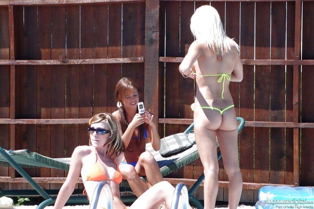 Seductive floosies in bikinis filming their lesbian games outdoor - #13