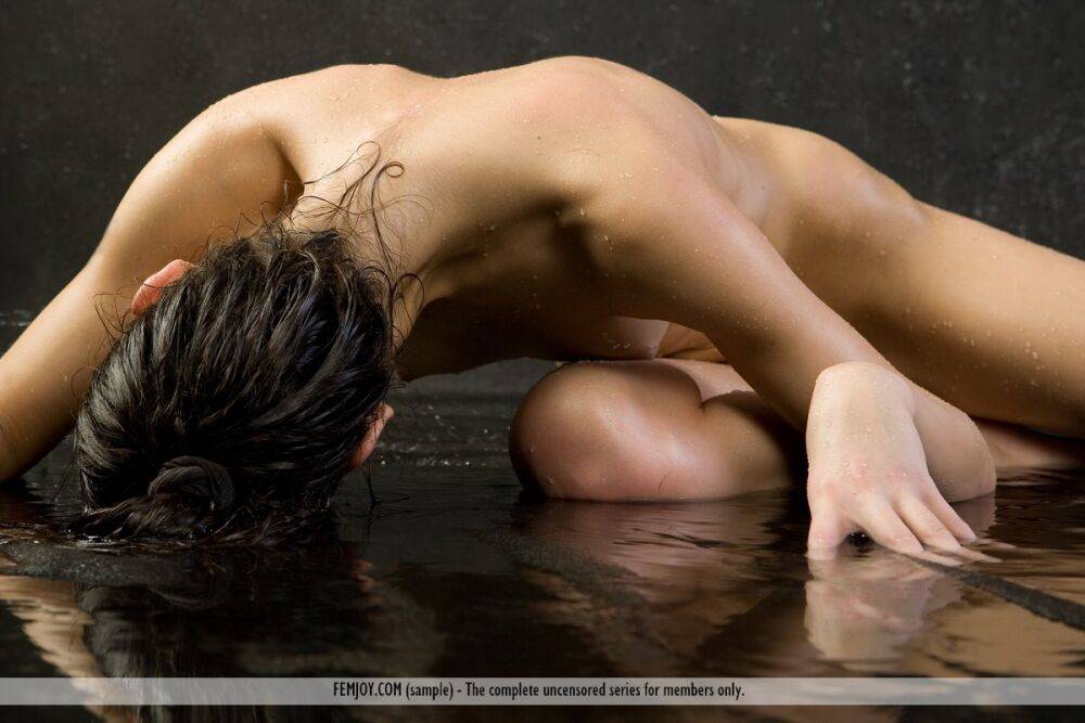 Slender teen Dasha B gets wet while while posing her beauty in the nude - #11