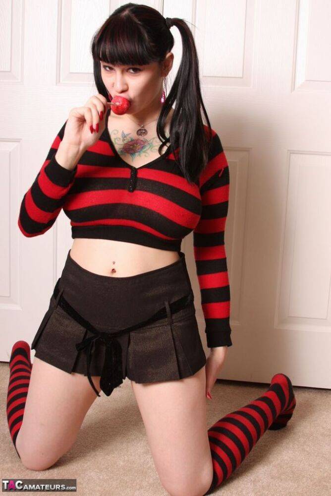 Cute brunette Susy Rocks socks on candy while in a micro skirt and pigtails - #9