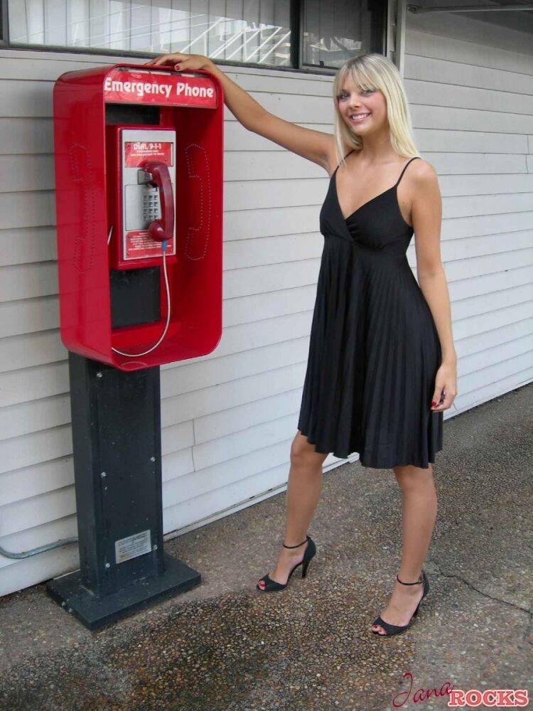 Blonde amateur Jana Jordan flashes her panties at a public phone - #4