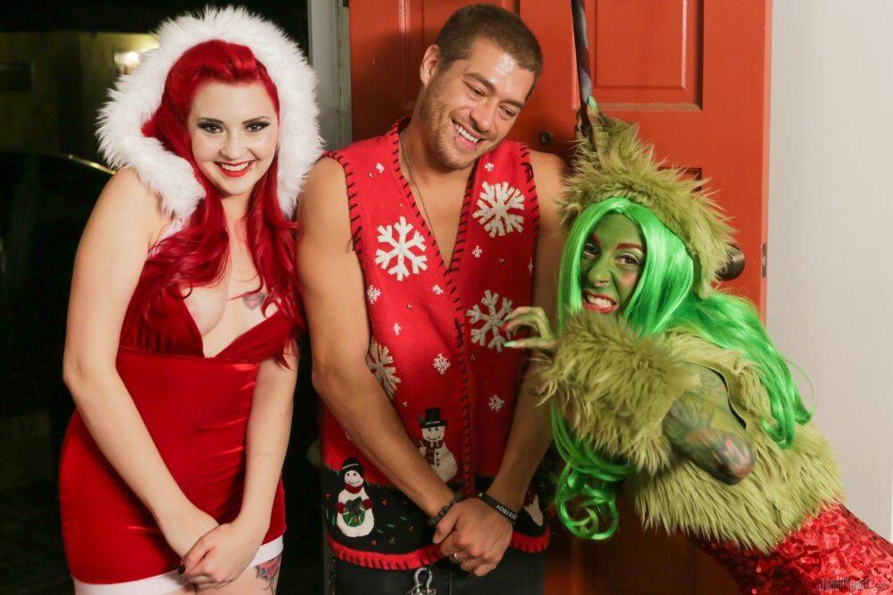 Tattooed redhead fucks a thick cock during kinky cosplay sex at Christmas | Photo: 1054756