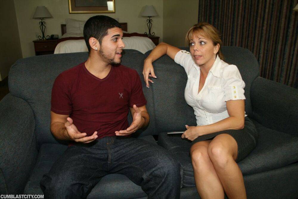 Big titted woman undresses before jerking off her stepson on a couch - #9