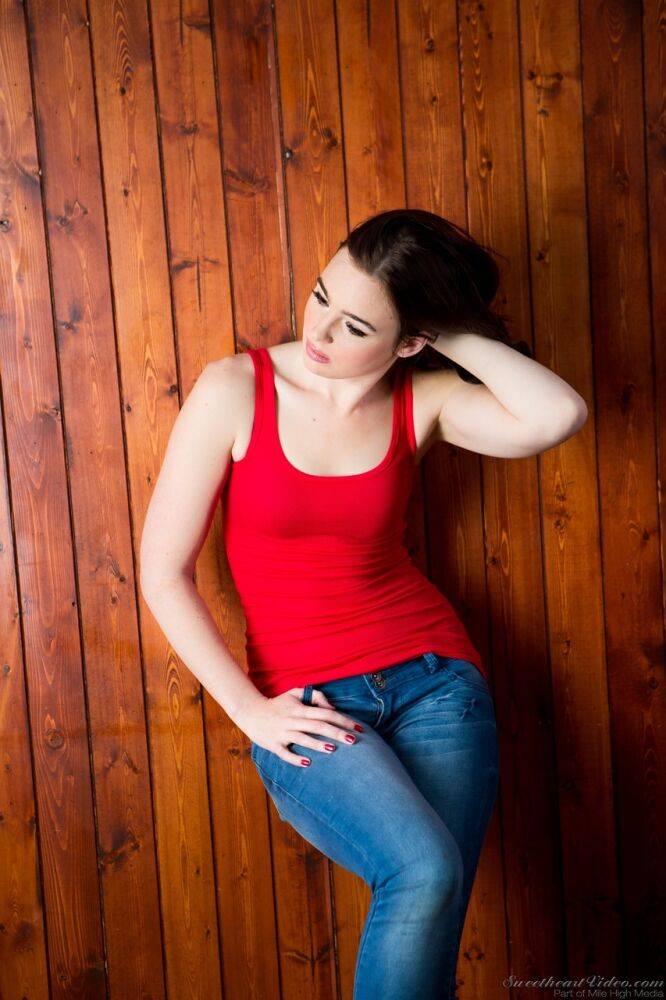 Brunette Jodi Taylor in jeans undressing to show hard nipples & bald pussy - #9