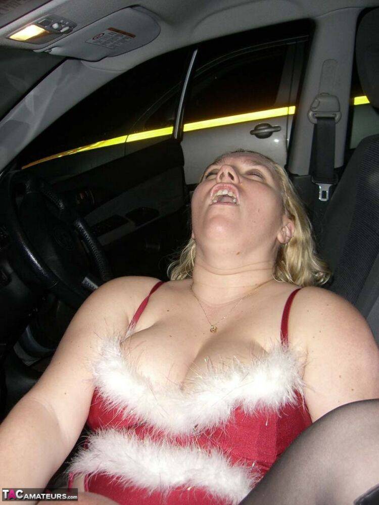 Mature blonde Barby sucks off a cock in a car while wearing Xmas lingerie - #4