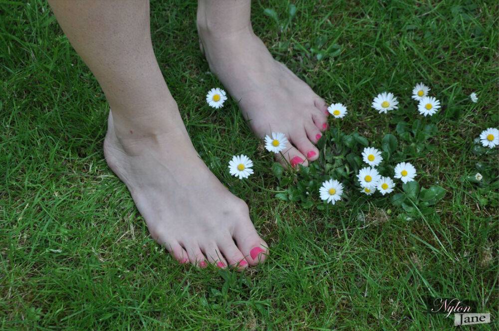 British woman Piage Turnah licks and sucks her own toes on the lawn - #6