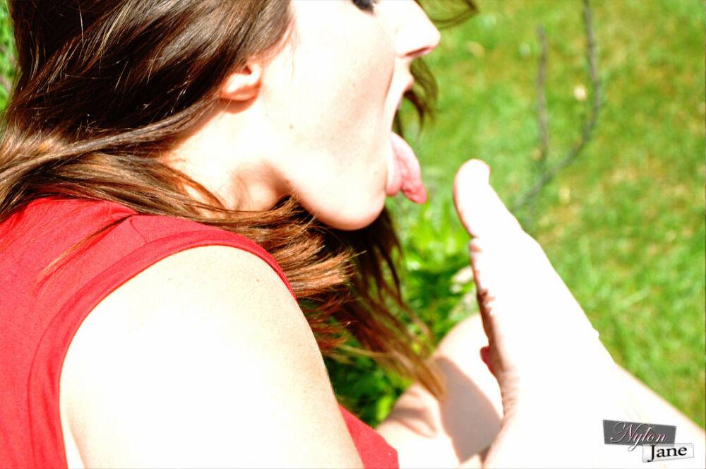 British woman Piage Turnah licks and sucks her own toes on the lawn - #14