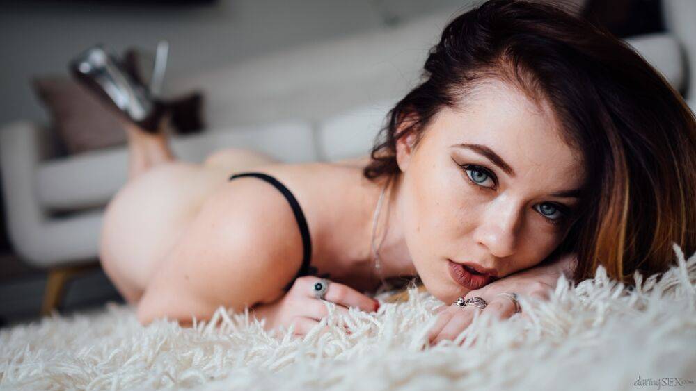 Pale redhead model Misha Cross crosses her legs to display her tight pussy - #12