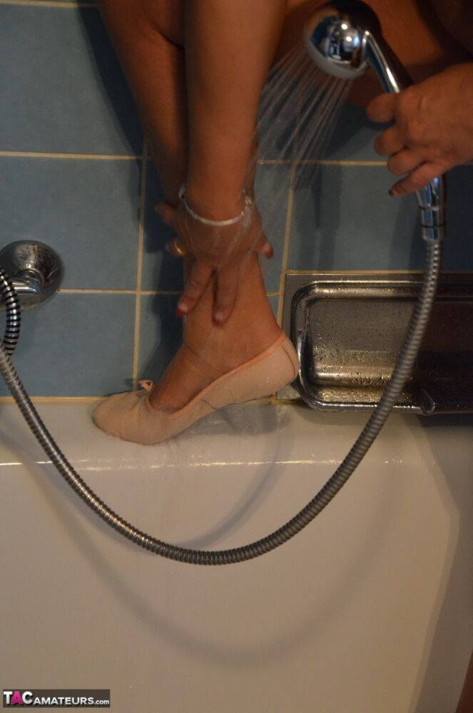 Chubby mature woman Sweet Susi takes a shower with footwear on - #8