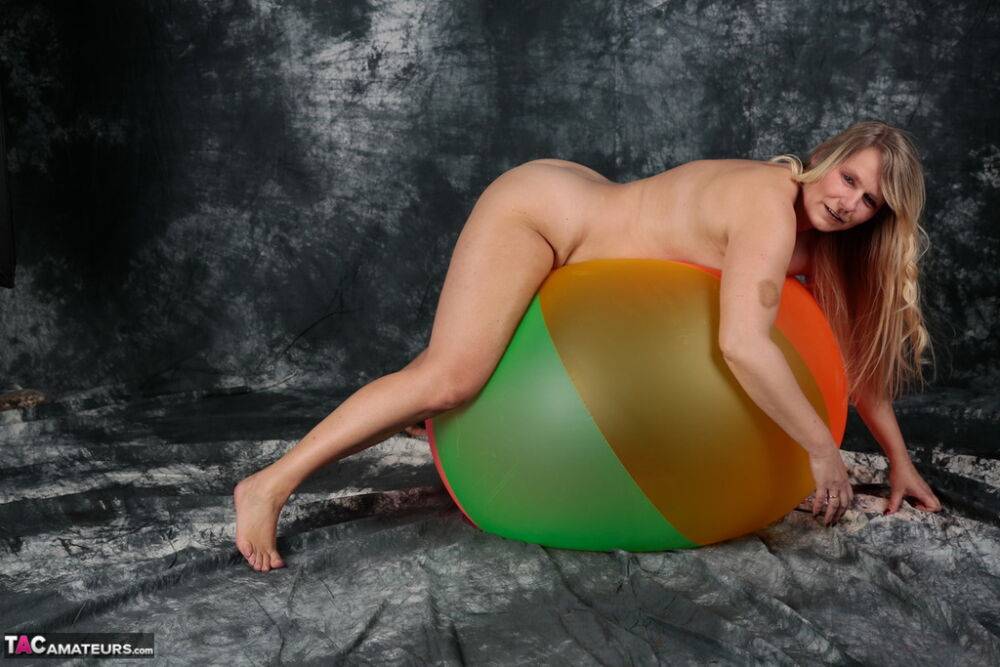 Blonde amateur Sweet Susi gets totally naked on top of a bouncy ball - #2