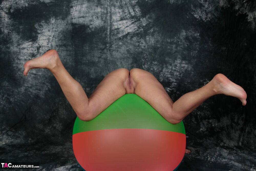 Blonde amateur Sweet Susi gets totally naked on top of a bouncy ball - #12