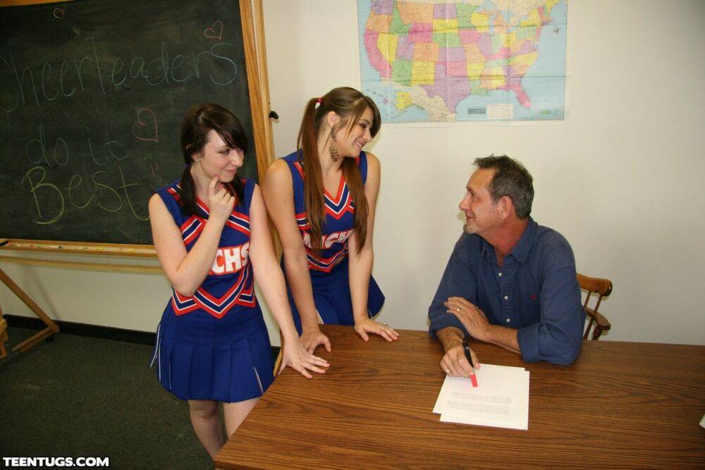 2 cheerleaders jerk off their geography teacher on top of his desk - #5