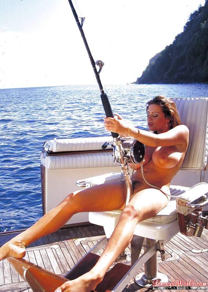 Hot chick Linsey Dawn McKenzie fishing on boat in the nude - #1