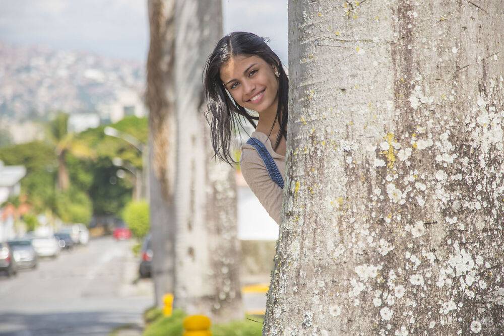 Clothed brunette teen Denisse Gomez shows off her pretty face in jean overalls - #11