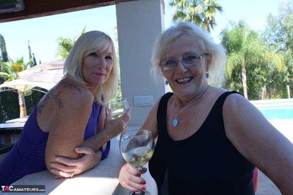 Old women share a lesbian kiss after drinking to much wine out on the patio - #14