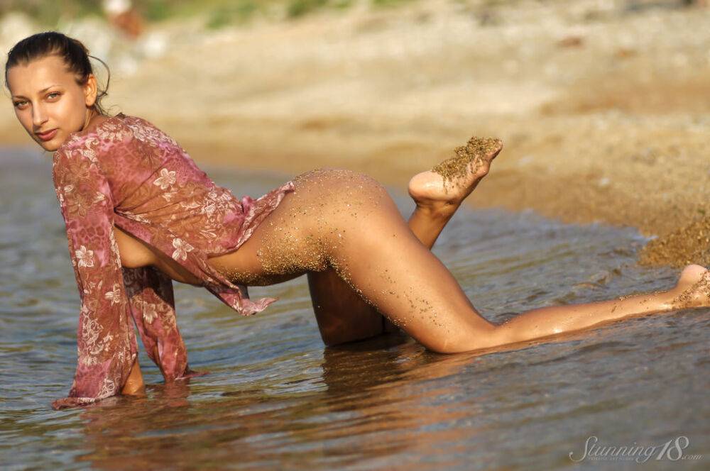 Young beauty Ambrosine M hits upon great poses in the water and on the beach - #5