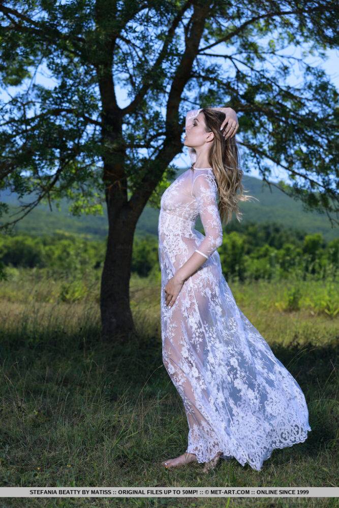 Hot teen Stefania Beatty slips out of a sheer dress to pose naked in a field - #14