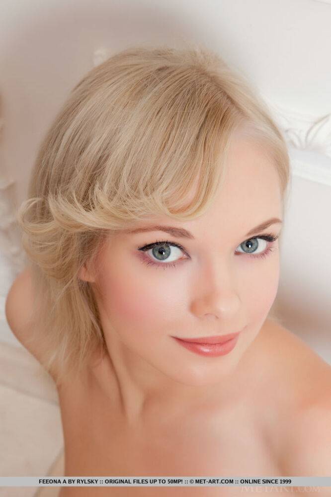 Young blonde Feeona A sheds red lingerie to pose naked in red stockings - #4