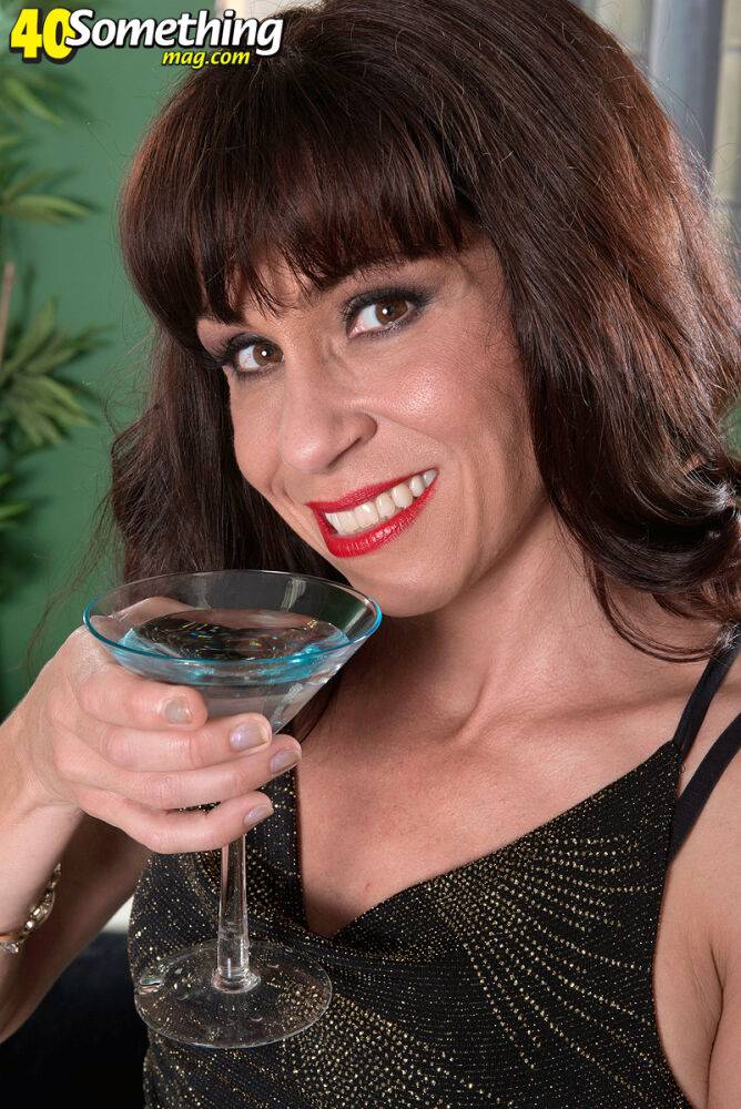 Mature lady Sage Quest downs a martini prior to undressing - #13