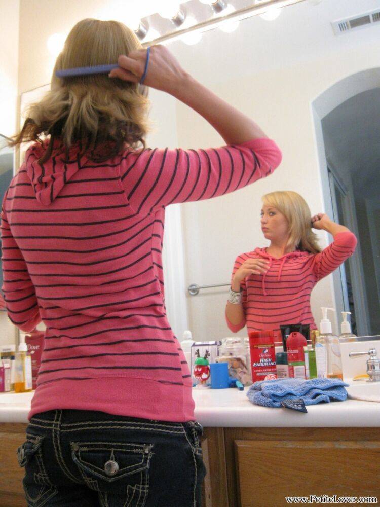 Young blonde girl Tiff fixes her hair while sporting a whale tail - #2