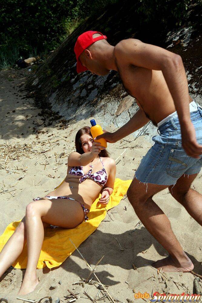 Busty teen girl has sex with a local while vacationing on a sandy beach - #6