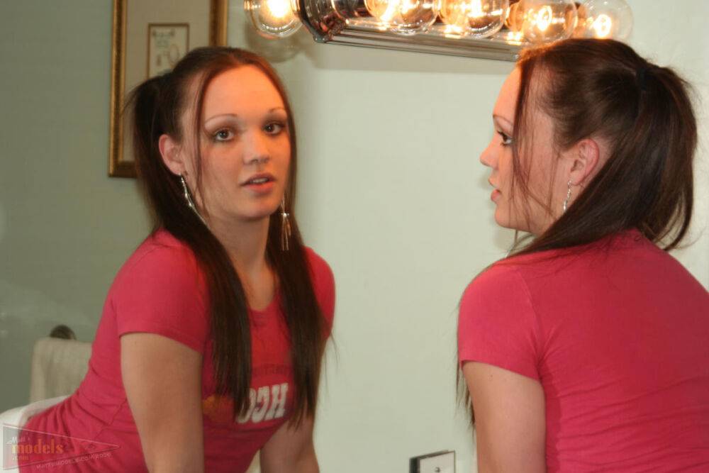 Brunette amateur Krystal sports long pigtails while going nude in a bathroom - #6