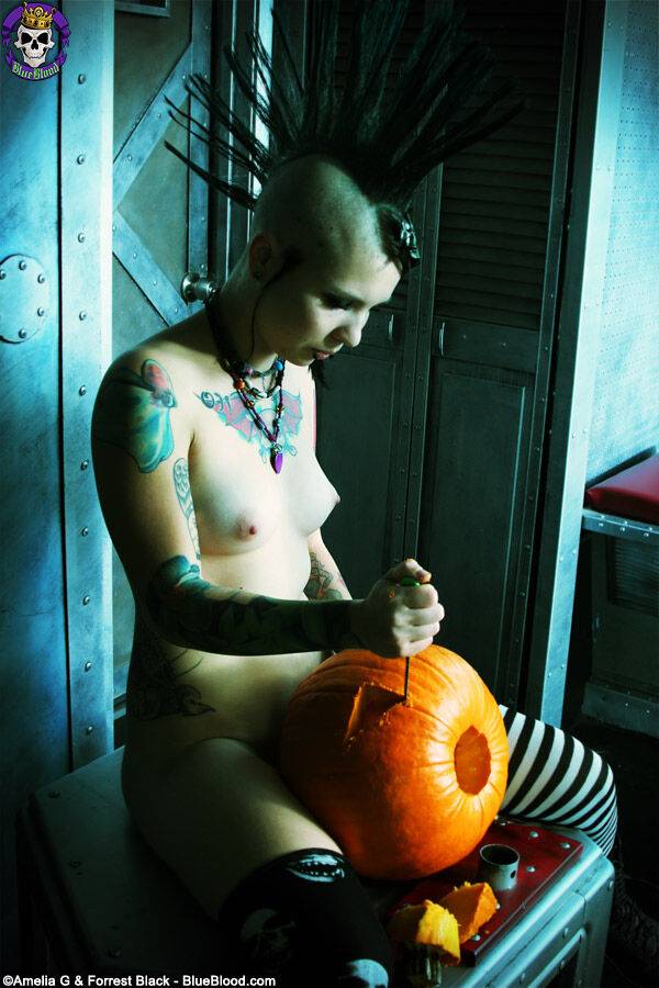 Alternative girl Tara Toxic carves a pumpkin in thigh highs and boots - #13