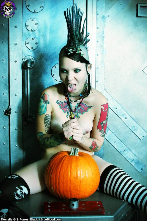 Alternative girl Tara Toxic carves a pumpkin in thigh highs and boots - #11