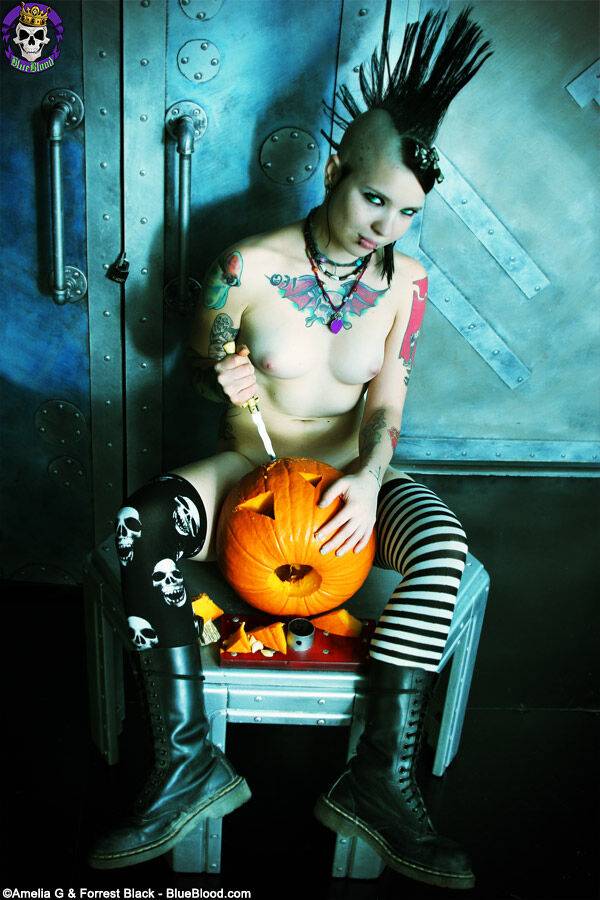 Alternative girl Tara Toxic carves a pumpkin in thigh highs and boots - #12