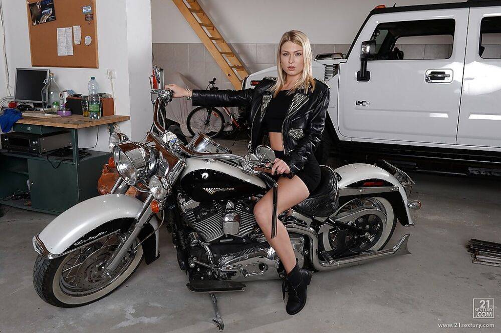 European babe Lucy Heart is posing in her awesome skirt on a bike - #12