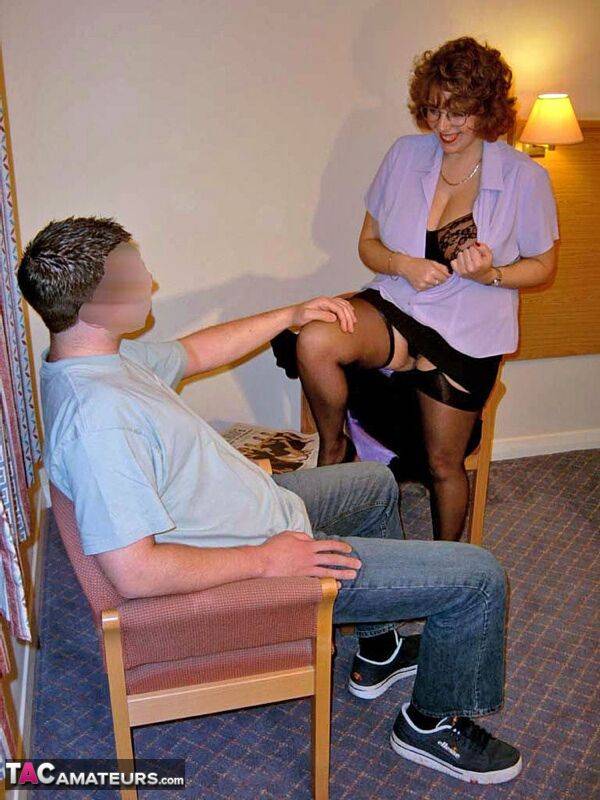 Fat mature escort with curly red hair entertains a man in a motel room - #14