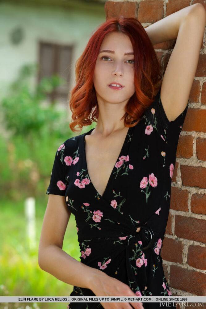 Redheaded teen Elin Flame gets completely naked on a wooden chair - #15