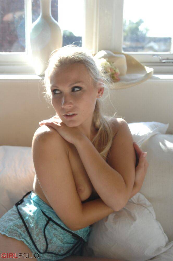 Blonde glamour model Michaela sets her from tits free of a lingerie on a couch - #2
