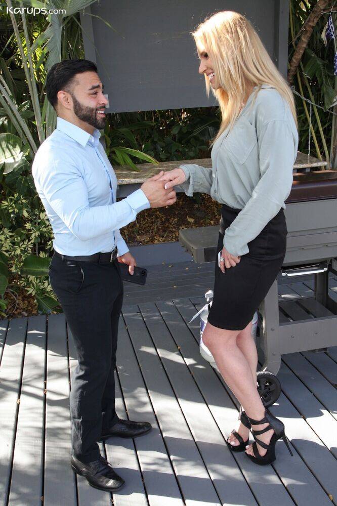 Tall blonde Rachael Cavalli seduces her man friend in a black skirt and heels - #13