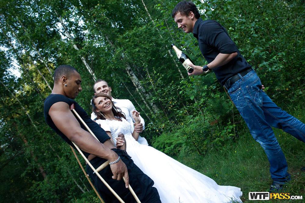 Promiscuous bride enjoys a hardcore foursome with well-hung guys outdoor | Photo: 2401152