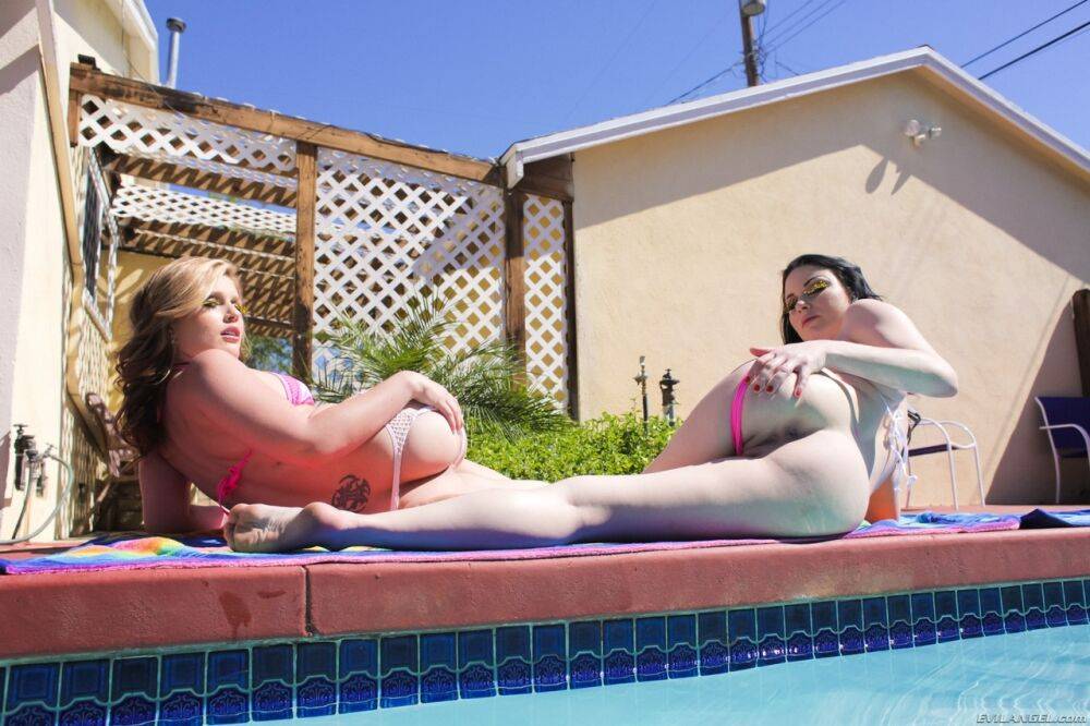 Pornstars Veruca James & Sasha Heart show their booties while naked in a pool - #3