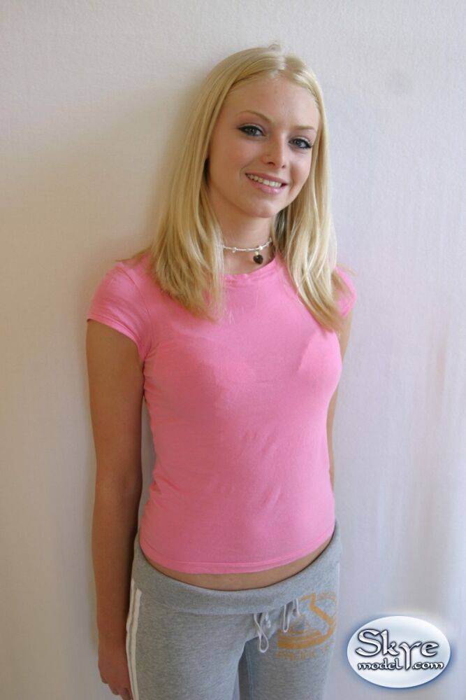 Cute teen girl Skye Model hangs out in a pink shirt and her yoga pants - #4