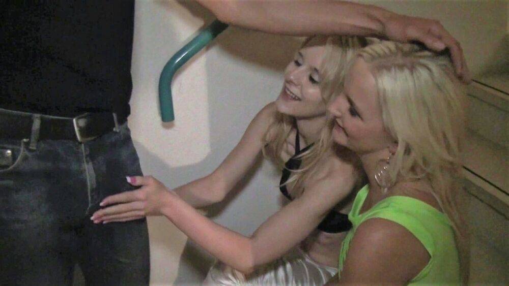 Blonde girls take turns sucking their guy friend's penis in a stairwell - #9