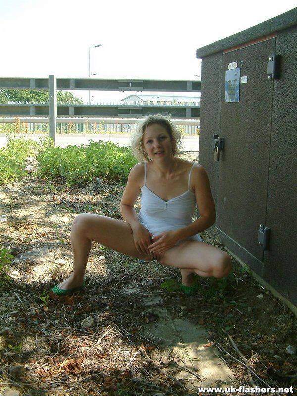 Blonde girl from the UK flashes a no panty upskirt before peeing in public - #6