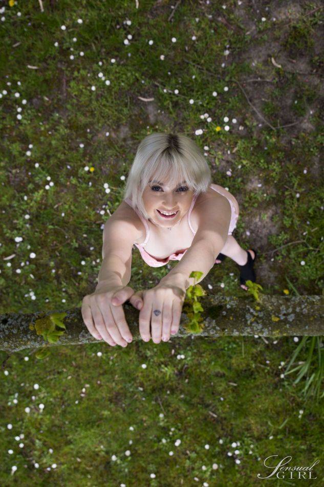 Platinum blonde teen Miss Melissa gets totally naked under a tree in bloom - #8