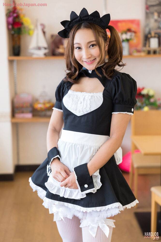 Cute Japanese maid gives her boss a handjob after he watches her masturbate | Photo: 2565693