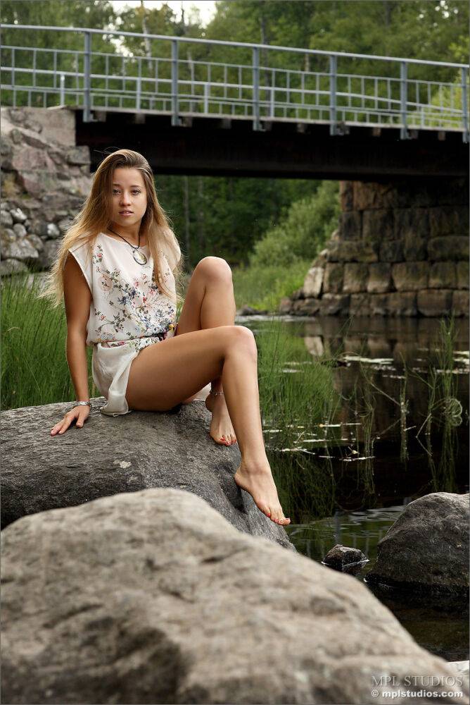 Gorgeous blonde model gets naked by the river to air her hot skinny body - #12