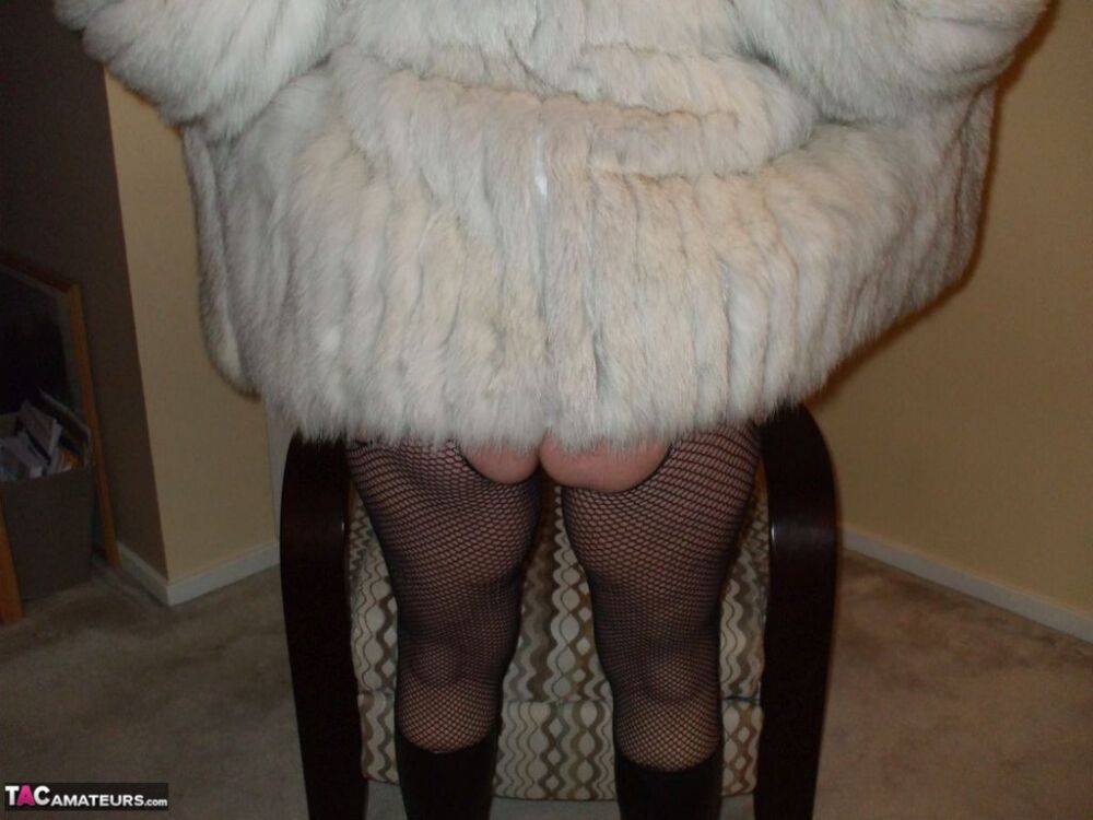 First timer Busty Bliss gives a POV blowjob in a fur coat and mesh hosiery - #1