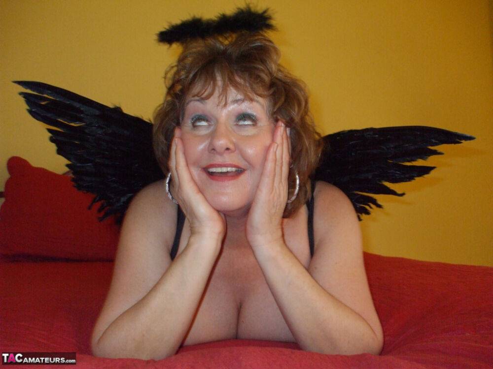 Mature amateur Busty Bliss sports a halo and angel wings while giving head - #2