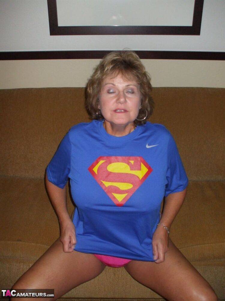 Older amateur Busty Bliss looses her big tits from a Superman T-shirt - #3