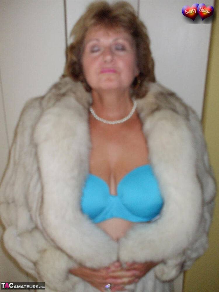 Mature amateur Busty Bliss frees her tan lined tits from a bra and fur coat - #3