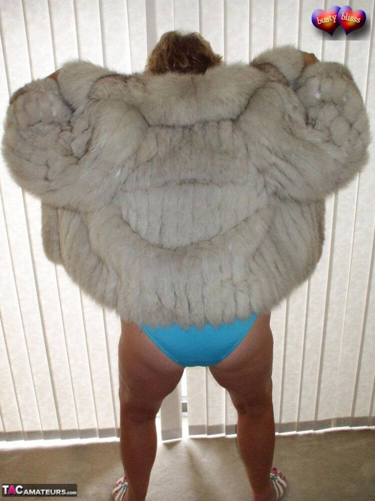 Mature amateur Busty Bliss frees her tan lined tits from a bra and fur coat - #16