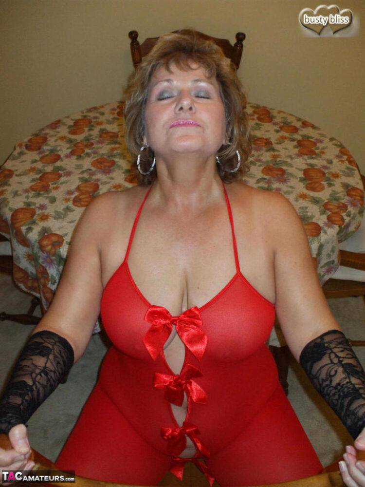 Aged amateur Busty Bliss slurps on a cold beverage while modeling red lingerie - #14